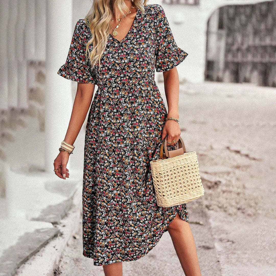 Lena – legende sommerkjole i abrikos med blomsterprint