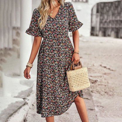 Lena – legende sommerkjole i abrikos med blomsterprint