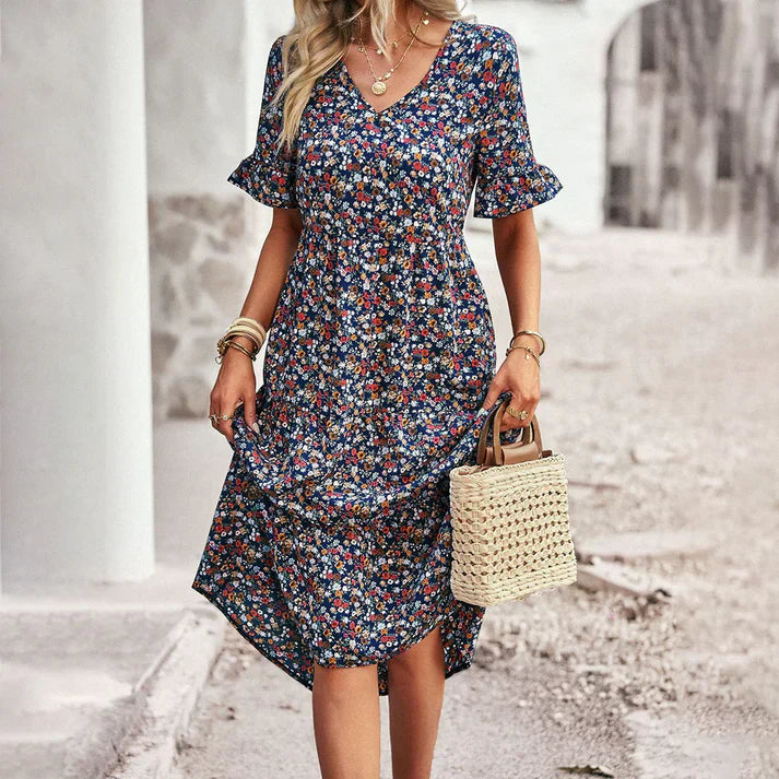 Lena – legende sommerkjole i abrikos med blomsterprint