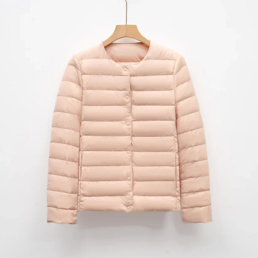 Freja – lightweight fitted down jacket with snap closure