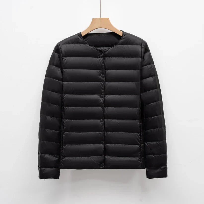 Freja – lightweight fitted down jacket with snap closure