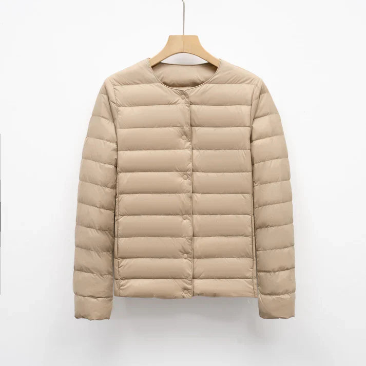 Freja – lightweight fitted down jacket with snap closure